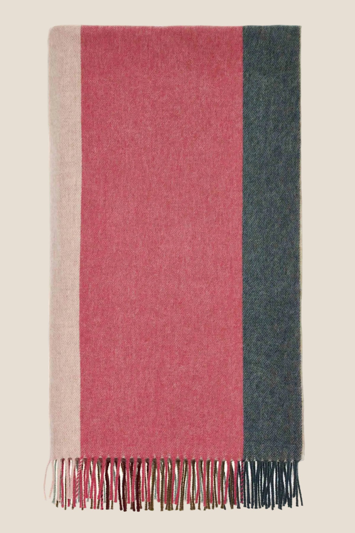 Multicolored striped scarf with fringes on a white background